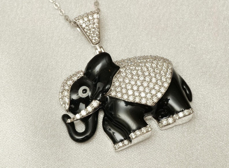 Sparkling Diamond Elephant Pendant in 14k Gold