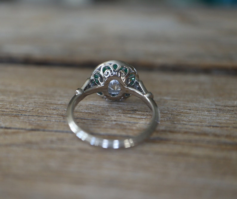 Art Deco Inspired Diamond and Colombian Emerald Halo Ring in 18k White Gold