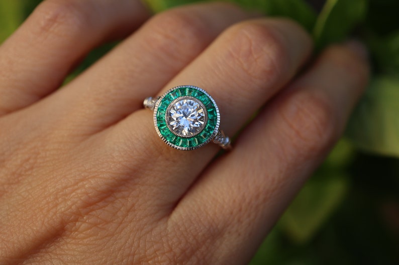 Art Deco Inspired Diamond and Colombian Emerald Halo Ring in 18k White Gold