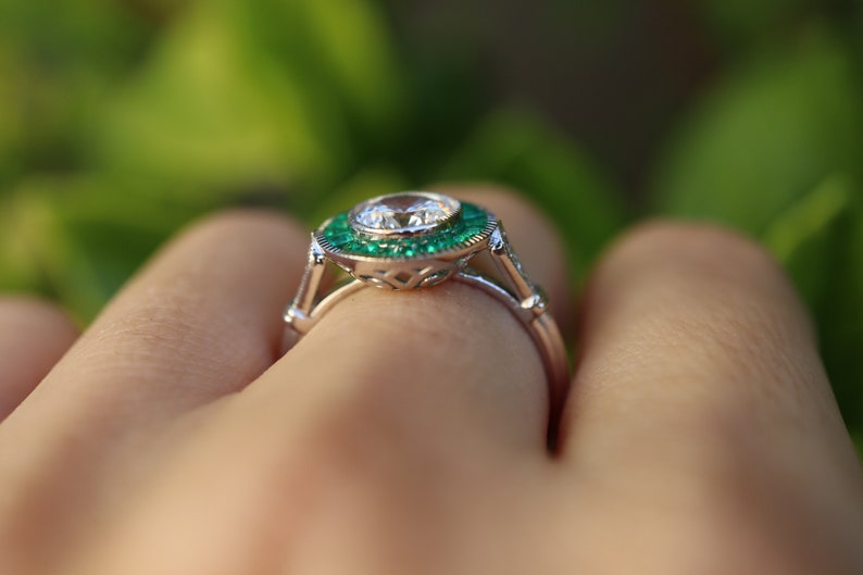 Art Deco Inspired Diamond and Colombian Emerald Halo Ring in 18k White Gold