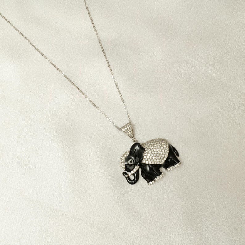 Sparkling Diamond Elephant Pendant in 14k Gold