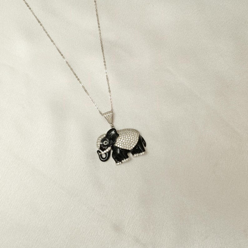Sparkling Diamond Elephant Pendant in 14k Gold