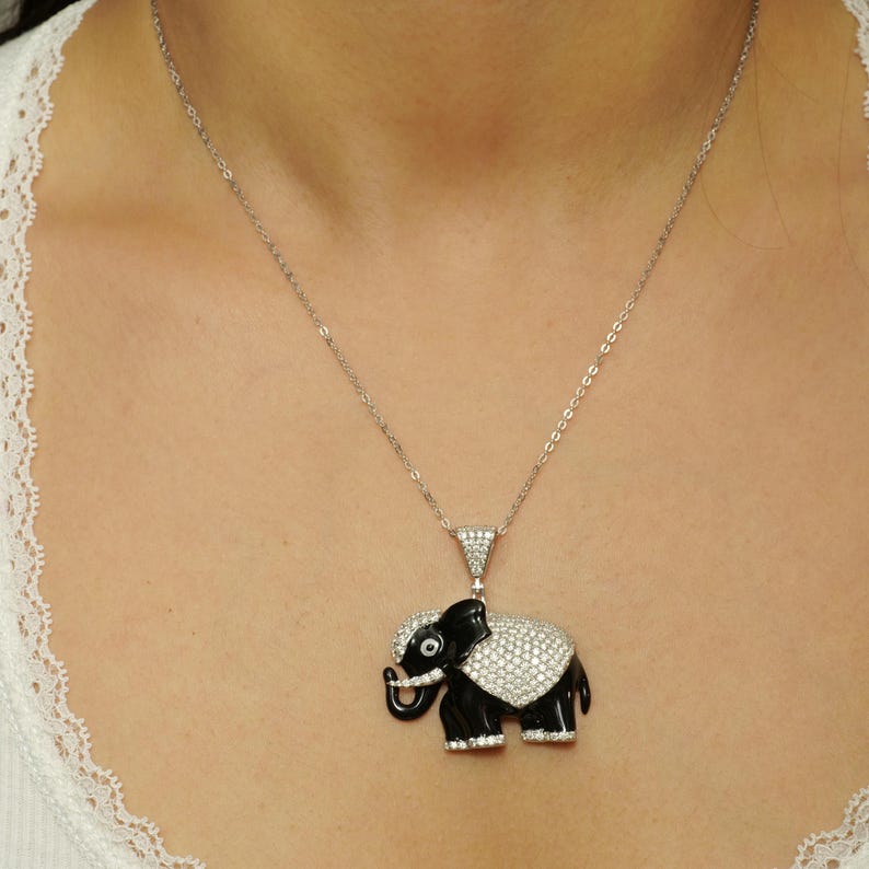 Sparkling Diamond Elephant Pendant in 14k Gold